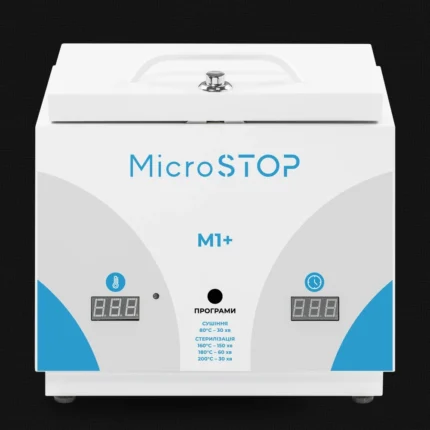 Сухожарова шафа Microstop М1+ спереду: два табло, кнопка вибору програм і таблиця режимів